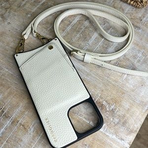 White and gold Bandolier iPhone 13Pro Max phone case and strap